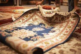Can antique rugs be professionally cleaned?
